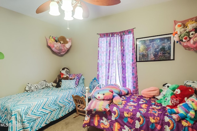 152 Sycamore Dr, Pass Christian, MS 39571 - carpeted bedroom featuring a ceiling fan