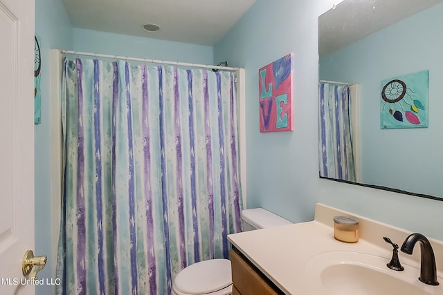152 Sycamore Dr, Pass Christian, MS 39571 - bathroom with toilet, vanity, and a shower with curtain