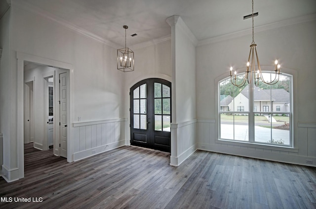 100 Grayson Way, Madison, MS 39110 - foyer with a notable chandelier, wood finished floors, crown molding, arched walkways, and french doors