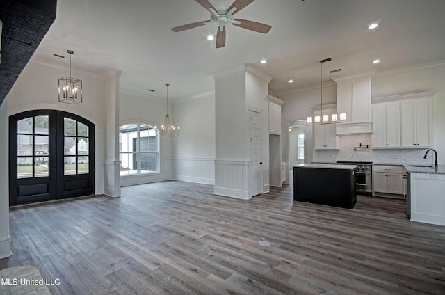 100 Grayson Way, Madison, MS 39110 - kitchen featuring a sink, stainless steel range, a kitchen island, french doors, and open floor plan
