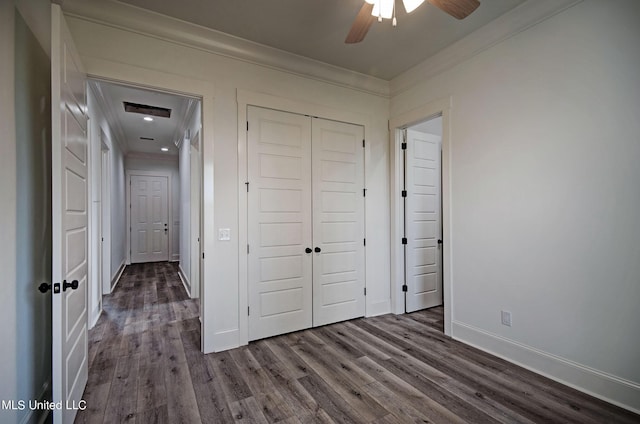 100 Grayson Way, Madison, MS 39110 - unfurnished bedroom featuring dark wood-style floors, a closet, and crown molding