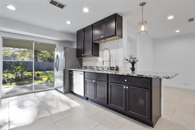 kitchen featuring dark brown cabinetry, sink, stainless steel fridge with ice dispenser, dishwashing machine, and pendant lighting