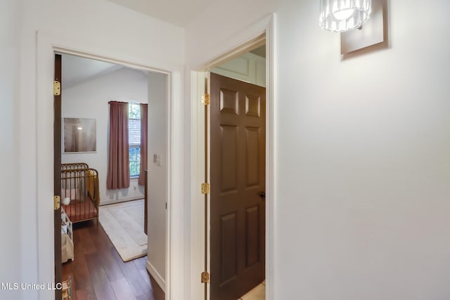 hall with wood finished floors