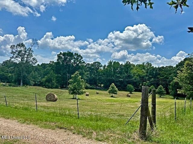 exterior space with a rural view