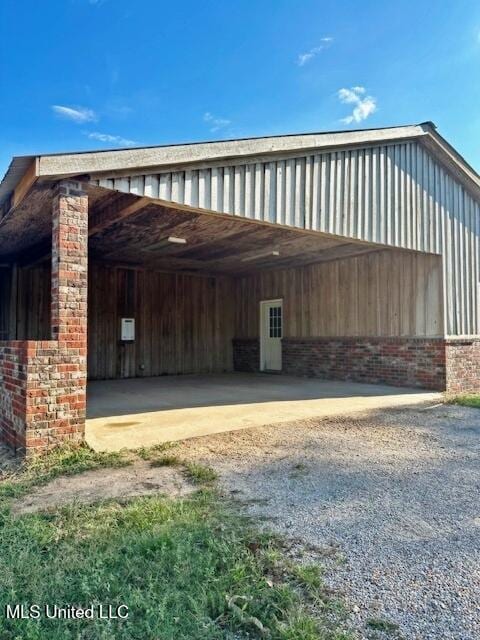 view of parking featuring a carport