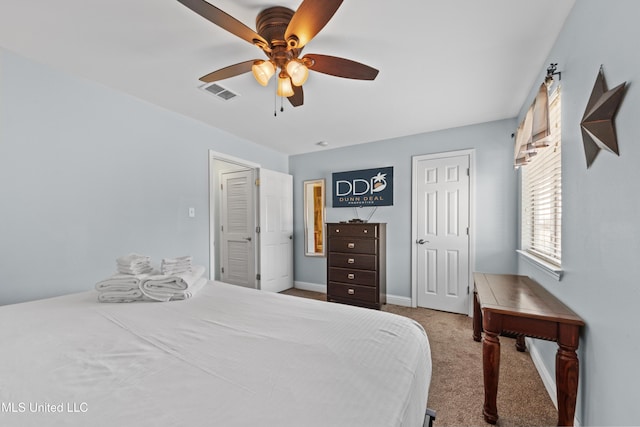 bedroom with visible vents, ceiling fan, baseboards, and carpet floors