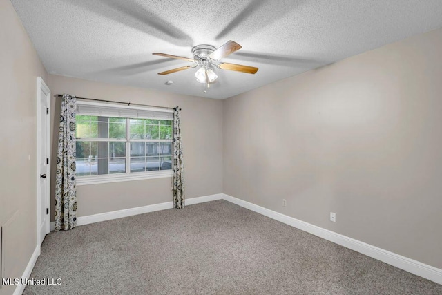 139 Booth Cir, Ocean Springs, MS 39564 - spare room with carpet, a textured ceiling, and ceiling fan