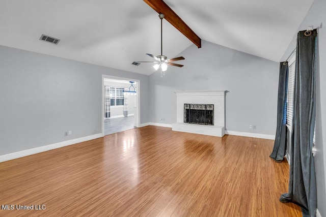 139 Booth Cir, Ocean Springs, MS 39564 - unfurnished living room featuring ceiling fan, light wood-type flooring, and a brick fireplace