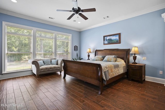 bedroom with baseboards, visible vents, dark wood-type flooring, and ornamental molding