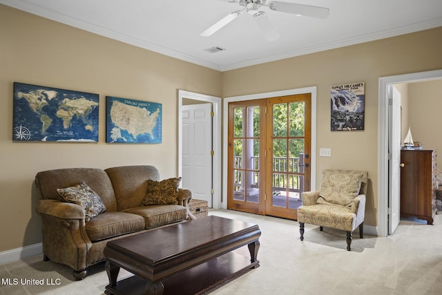 living room featuring baseboards, visible vents, and light colored carpet