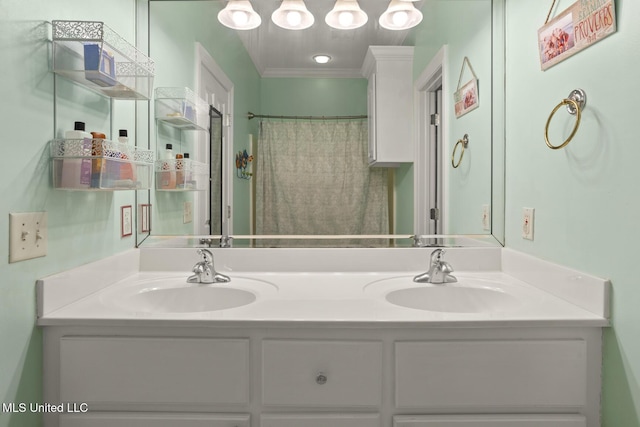 bathroom featuring a sink, double vanity, and crown molding