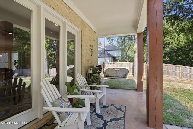 view of patio with fence