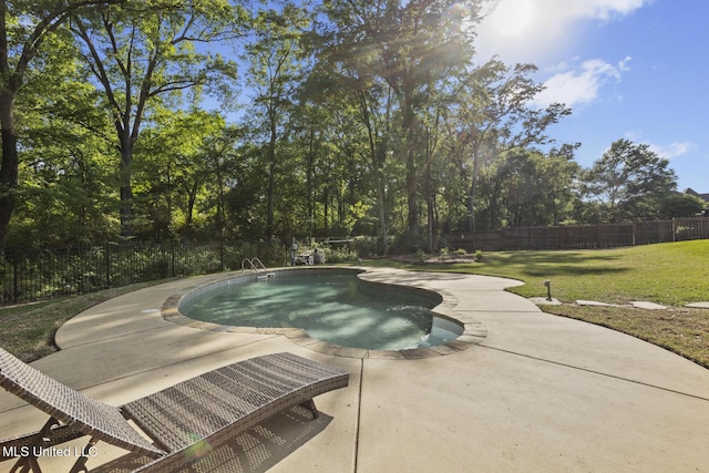 view of pool with a lawn, a fenced backyard, a fenced in pool, and a patio area