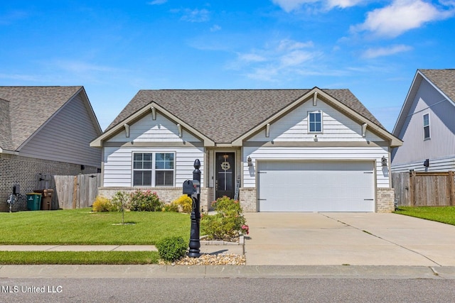 view of front facade with concrete driveway, fence, a front yard, brick siding, and a garage