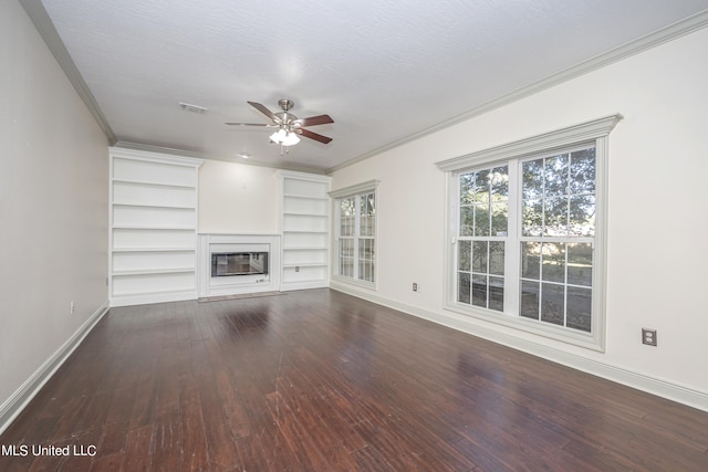 unfurnished living room with ornamental molding, a textured ceiling, wood-type flooring, and ceiling fan