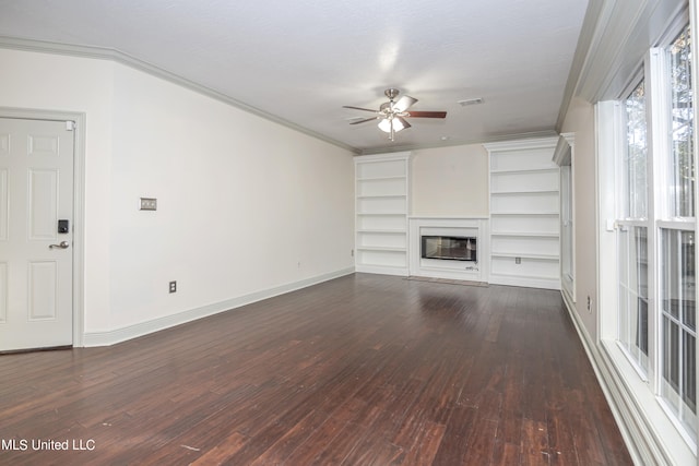 unfurnished living room with crown molding, ceiling fan, a textured ceiling, and dark hardwood / wood-style flooring