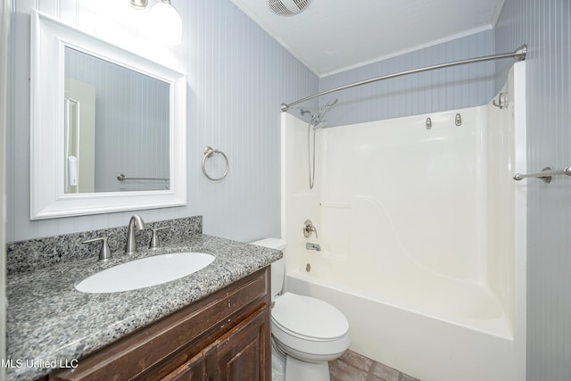 full bathroom with vanity, ornamental molding, washtub / shower combination, and toilet