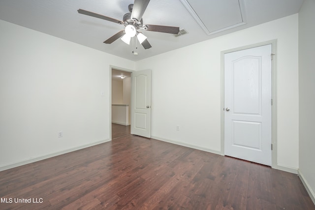 unfurnished bedroom with dark hardwood / wood-style floors and ceiling fan