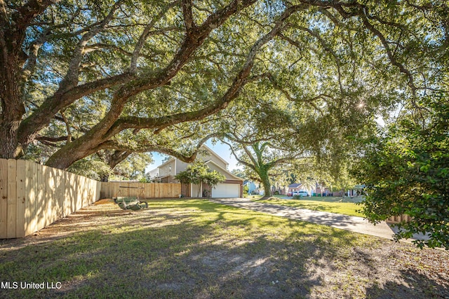 view of yard with a garage