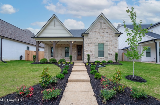 view of front of home with a front yard