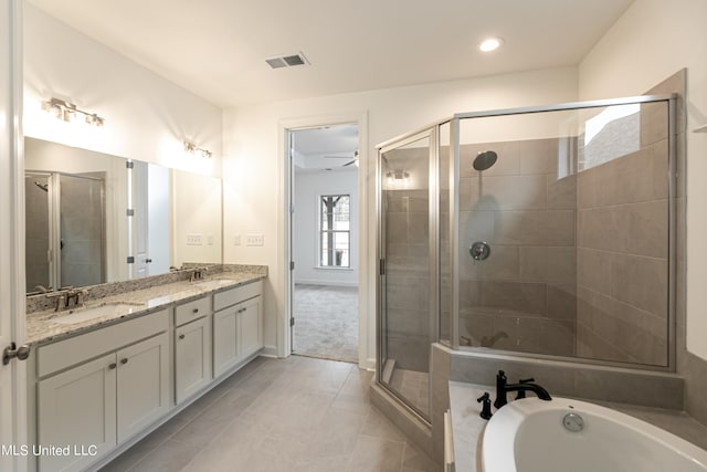 bathroom with vanity, shower with separate bathtub, tile patterned floors, and ceiling fan