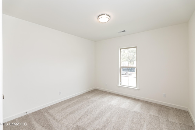 view of carpeted spare room