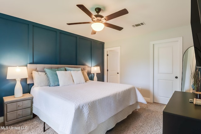 3927 Washington Ave, Gulfport, MS 39507 - bedroom featuring light colored carpet, ceiling fan, and baseboards