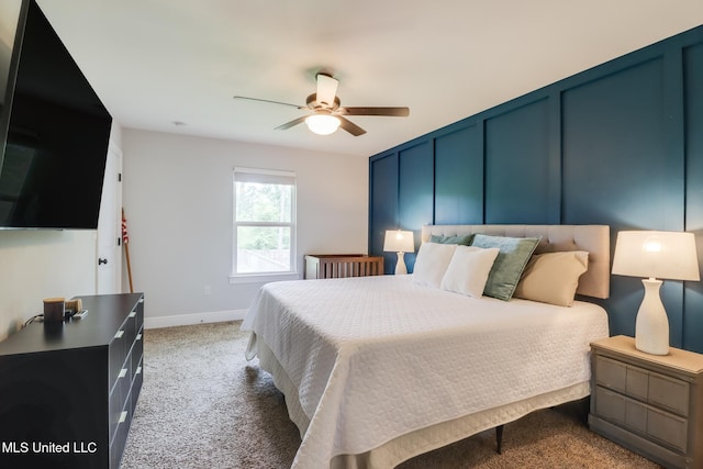 3927 Washington Ave, Gulfport, MS 39507 - bedroom with baseboards, carpet floors, and a ceiling fan
