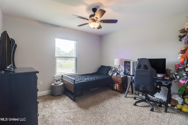 3927 Washington Ave, Gulfport, MS 39507 - bedroom featuring carpet floors, a ceiling fan, and baseboards