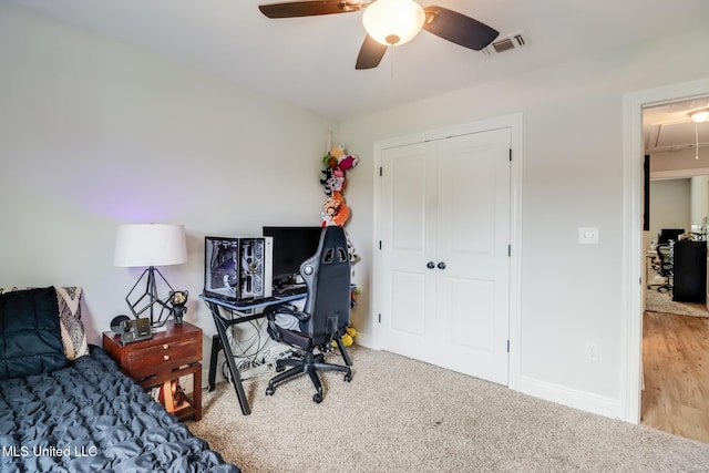 3927 Washington Ave, Gulfport, MS 39507 - carpeted bedroom with attic access, a closet, baseboards, and a ceiling fan