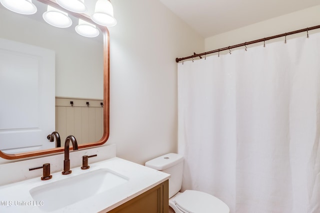 3927 Washington Ave, Gulfport, MS 39507 - bathroom featuring vanity, toilet, and a shower with shower curtain