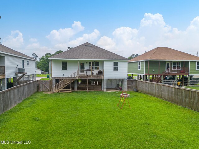 3927 Washington Ave, Gulfport, MS 39507 - back of house featuring stairs and a shingled roof