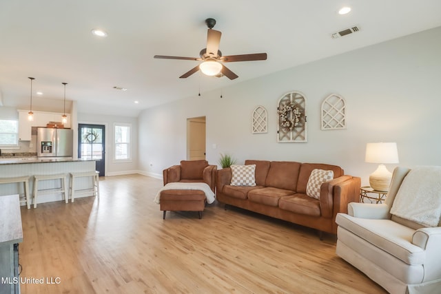 3927 Washington Ave, Gulfport, MS 39507 - living area with light wood-style floors, recessed lighting, a ceiling fan, and baseboards