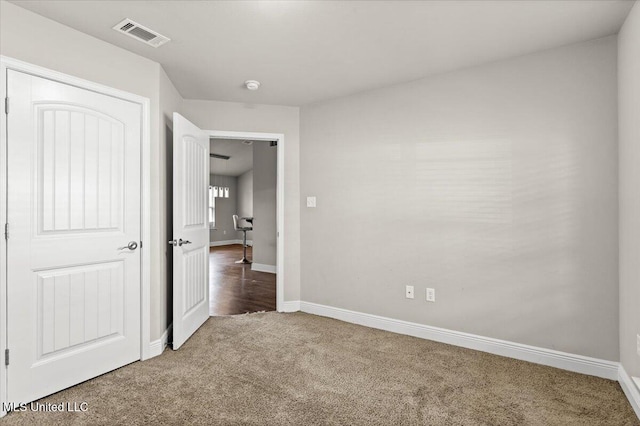 unfurnished bedroom featuring carpet floors