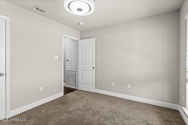 view of carpeted spare room