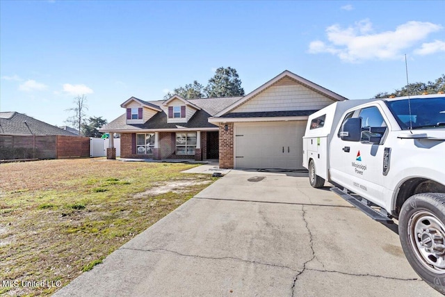 view of front of property featuring a garage