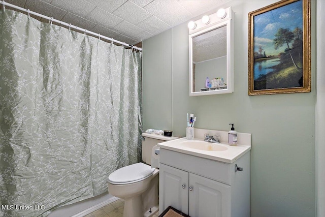 bathroom with vanity, toilet, and a shower with shower curtain