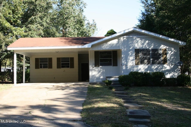 view of front of property with a carport