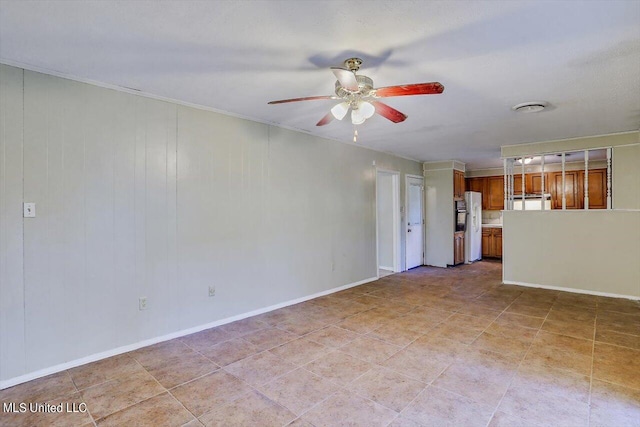 338 Lake Of Pines Dr, Jackson, MS 39206 - unfurnished living room with a ceiling fan and baseboards