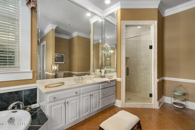 bathroom with vanity, crown molding, tile patterned flooring, and plus walk in shower