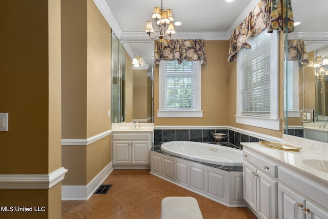 bathroom featuring vanity, crown molding, and a bathtub