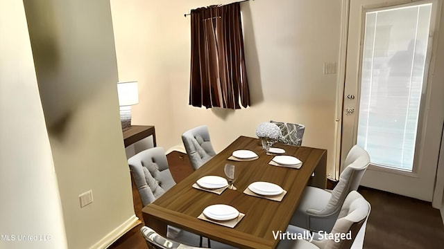 2515 Bryce Cv, Horn Lake, MS 38637 - dining room featuring wood finished floors and baseboards