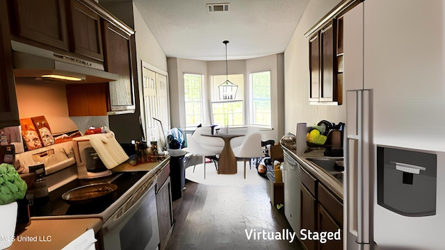 2515 Bryce Cv, Horn Lake, MS 38637 - kitchen with under cabinet range hood, electric stove, dark brown cabinetry, and fridge with ice dispenser