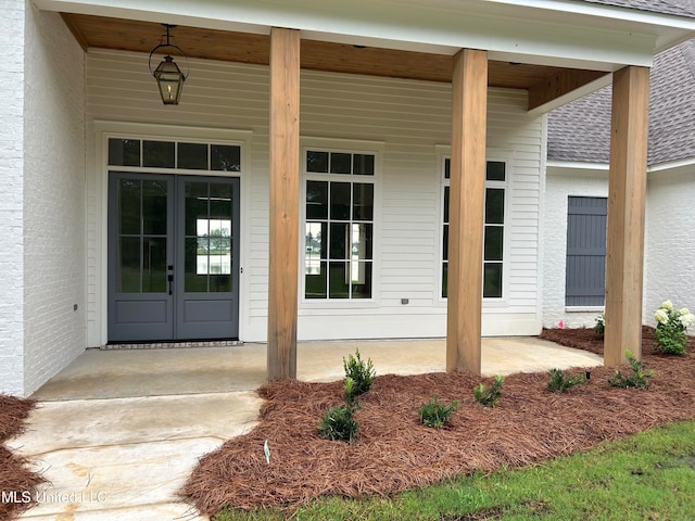 doorway to property featuring french doors