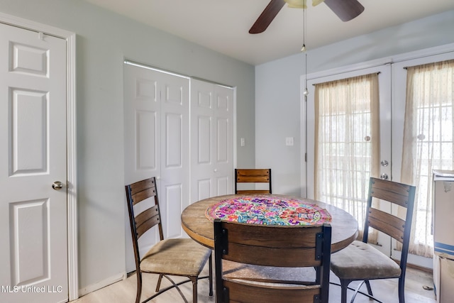 dining room featuring french doors and ceiling fan