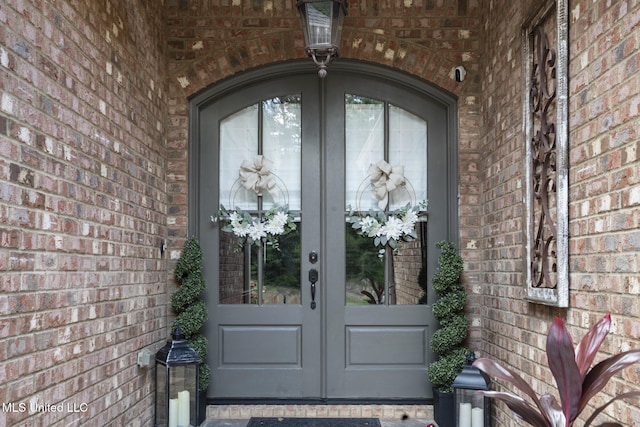 23 Callaway Ct, Hattiesburg, MS 39402 - property entrance with french doors and brick siding