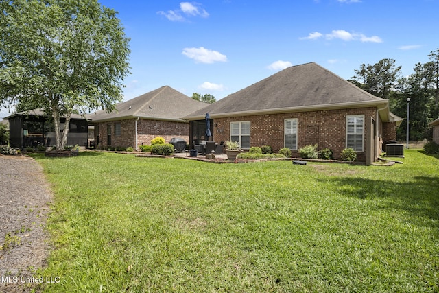 23 Callaway Ct, Hattiesburg, MS 39402 - rear view of property featuring a lawn, brick siding, and cooling unit