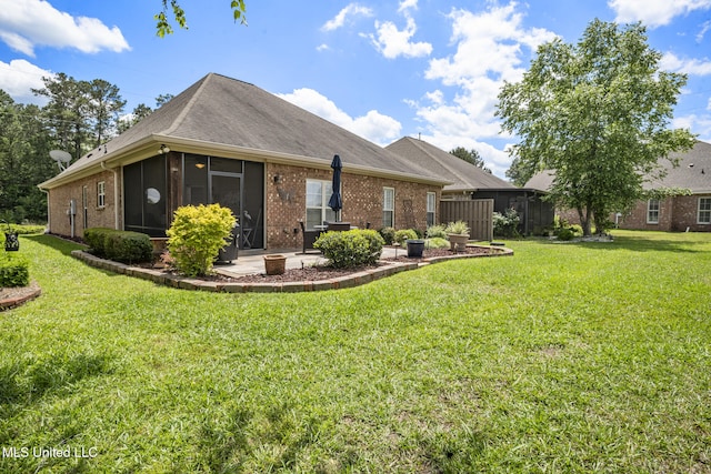 23 Callaway Ct, Hattiesburg, MS 39402 - view of front facade with brick siding, a front yard, a sunroom, a patio, and roof with shingles