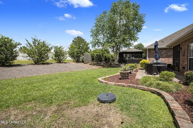 23 Callaway Ct, Hattiesburg, MS 39402 - view of green lawn with a gazebo and a patio