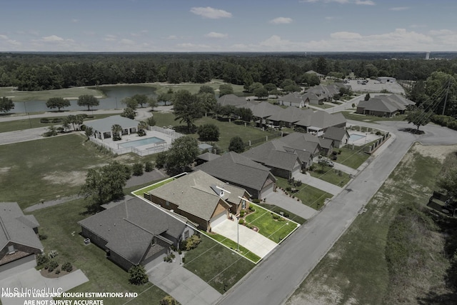 23 Callaway Ct, Hattiesburg, MS 39402 - aerial perspective of suburban area with a nearby body of water, property boundaries highlighted, a heavily wooded area, and a pool area